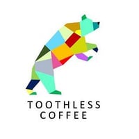 Toothless Coffee Roaster  logo